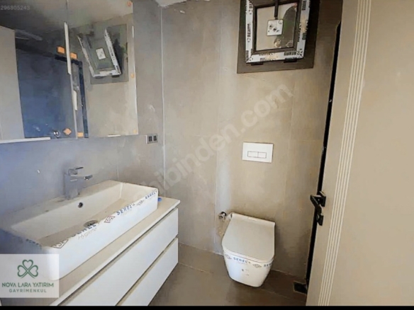 Antalya Altıntaş’ta İskanlı ve Lüks Konsept Sitede Satılık Havuz Manzaralı 2+1 Bahçe Katı Daire