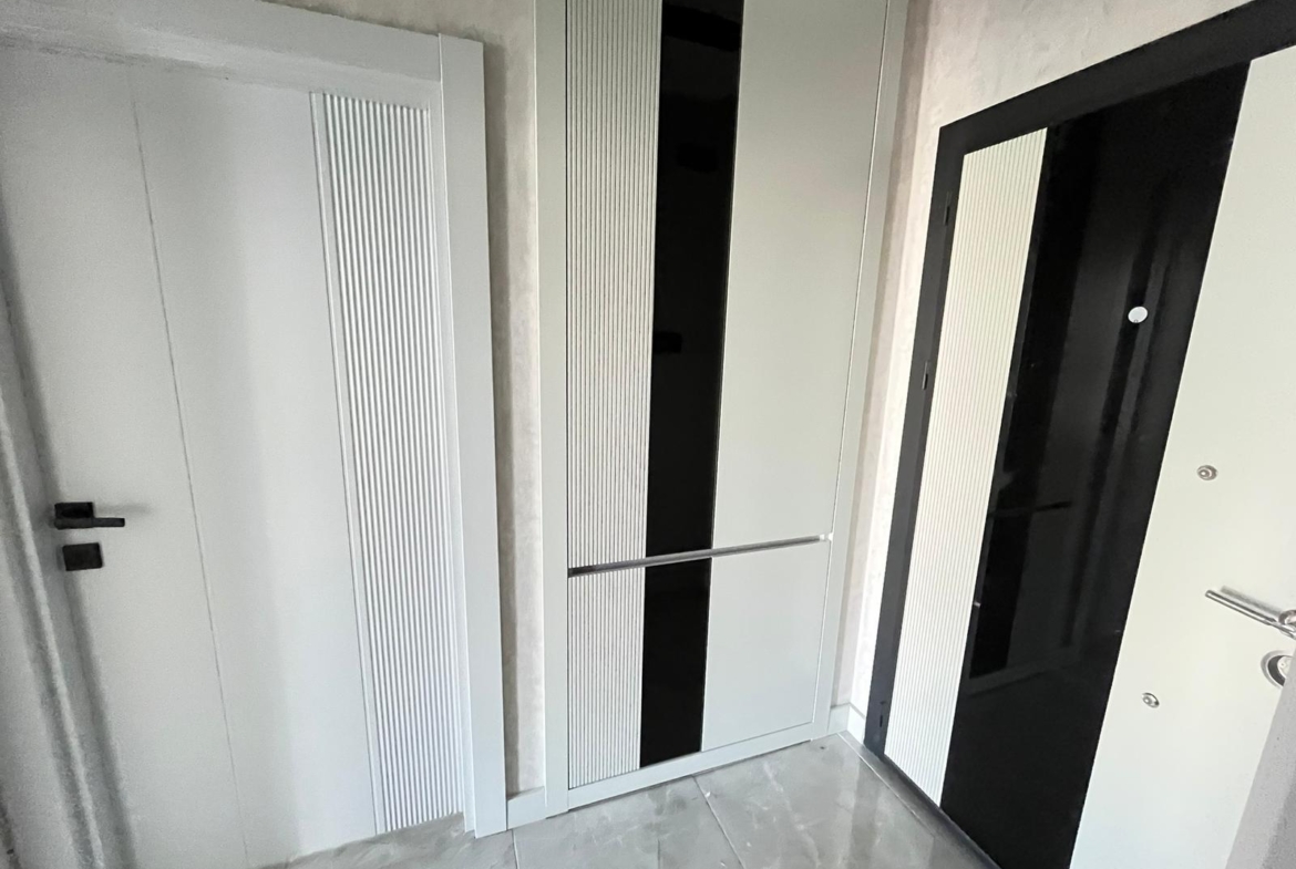 ÖZÇİÇEK’te LÜX SİTE İÇİ KORİDORLU 1+1