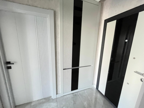 ÖZÇİÇEK’te LÜX SİTE İÇİ KORİDORLU 1+1