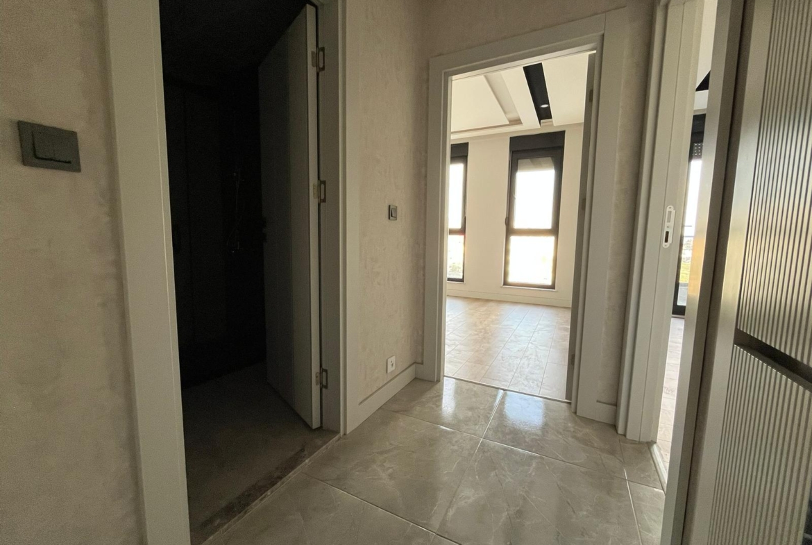ÖZÇİÇEK’te LÜX SİTE İÇİ KORİDORLU 1+1