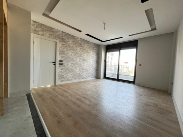 ÖZÇİÇEK’te LÜX SİTE İÇİ KORİDORLU 1+1