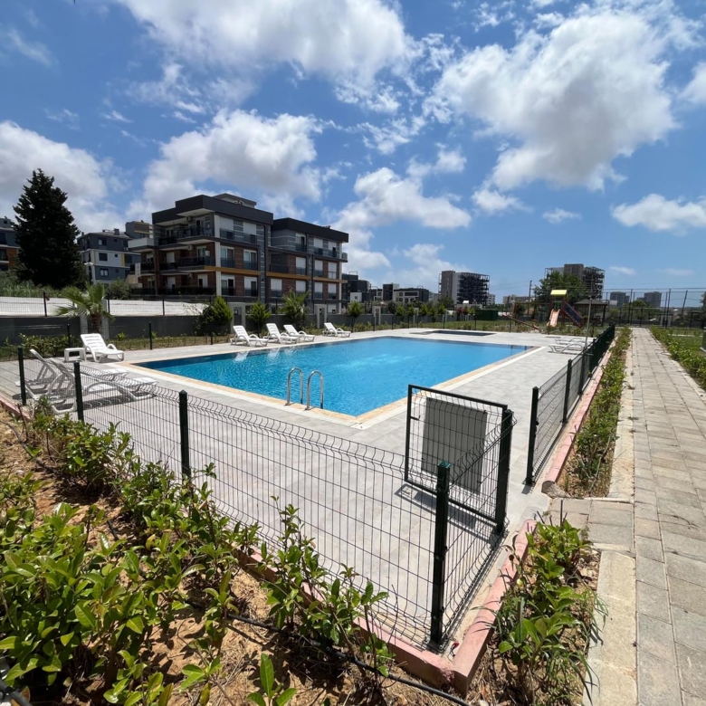 Antalya Altıntaş Sea Garden Sitesinde Yatırım Fırsatı Satılık 2+1 Havuzlu ve Bahçeli Daire